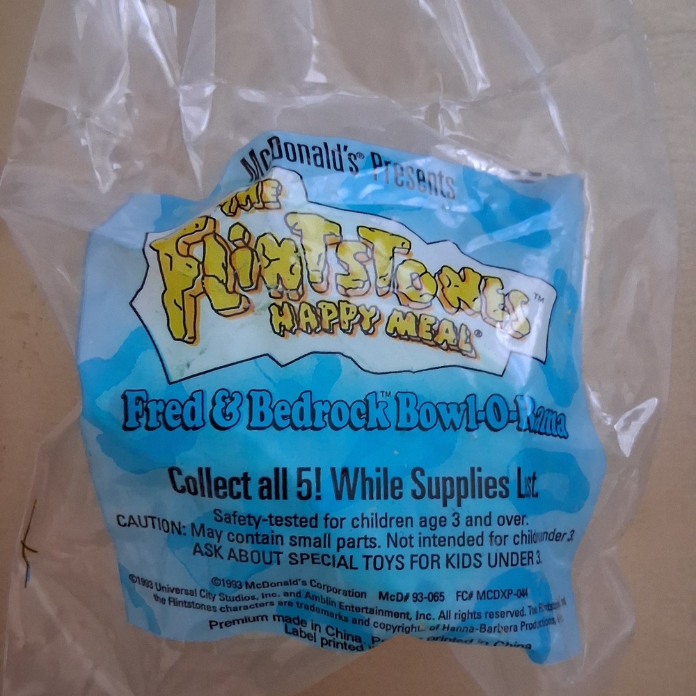 McDonald's Flintstones Fred & Bedrock Bowl-O-Rama Toy - Blue and Yellow